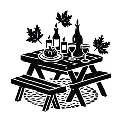 Autumn picnic table with pumpkin wine and candles