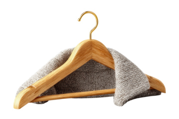 Sweater on a wooden hanger with gold hook for fashion display on transparent background
