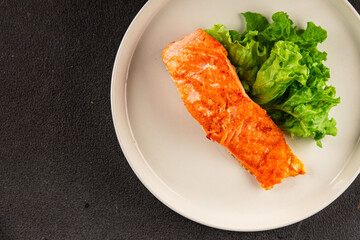 salmon fried fish seafood second course tasty snack fresh delicious gourmet food background on the table rustic food top view copy space pescetarian diet