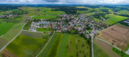 Aerial view of the village Esenhausen in Germany on a cloudy day in summer