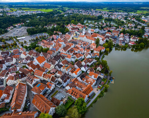 Aerial view around the old town of the city Bad Waldsee, 88339 in Germany on am overcast afternoon in summer.	