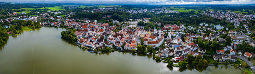 Aerial view around the old town of the city Bad Waldsee, 88339 in Germany on am overcast afternoon in summer.	