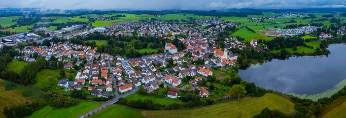Aerial of the city Kißlegg in Germany on a cloudy day in summer