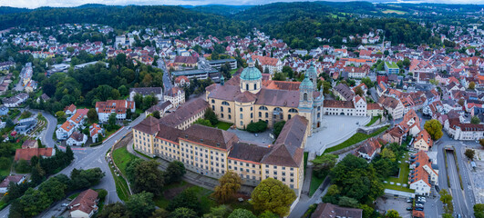 Aerial view around the old town of the city Weingarten, Ravensburg in Germany on am overcast afternoon in summer.	
