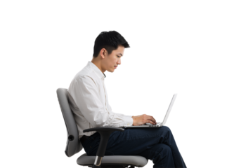 Side view of a focused young Asian professional sitting with poor posture while typing on a laptop, isolated on a transparent background
