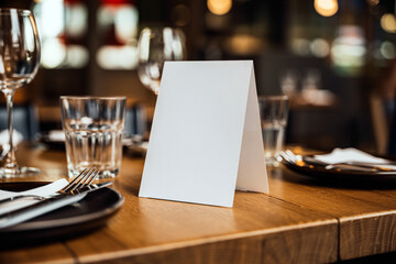 Blank White Table Tent Card Mockup on Restaurant Table | Reserved Sign Template for Special Events, Menu Presentation and Advertising