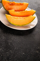 Melon Charente ripe sweet fruit tasty snack fresh delicious gourmet food background on the table rustic top view copy space keto and paleo diet vegan and vegetarian food