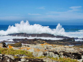 waves crashing on rocks