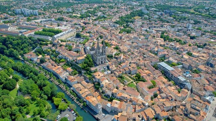 Aerial panorama view around the old town in the city Niort in France, on a sunny summer noon
