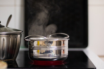 Steaming Pot on Modern Stovetop