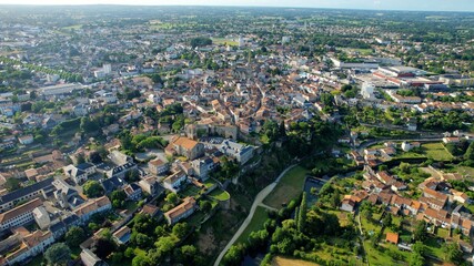 Aerial panorama view around the old town in the city Parthenay in France, on a sunny summer noon
