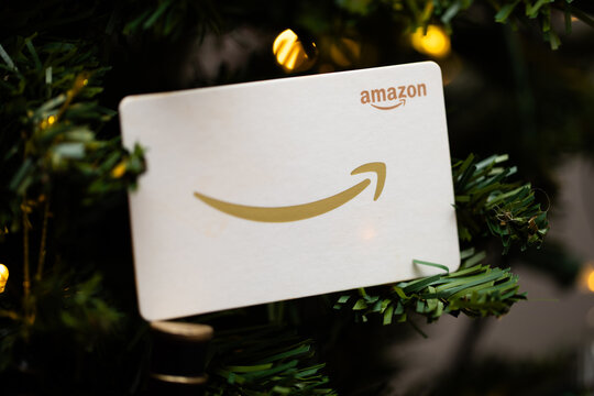 White and gold Amazon Gift Card on a Christmas Tree 