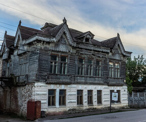 Weathered Old House with Carved Woodwork