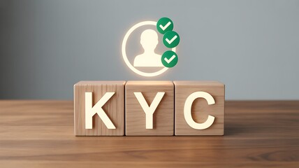 KYC acronym on wooden blocks with user verification icon