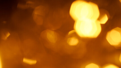 Elegant golden garland shining with luminous festive Christmas holiday background.