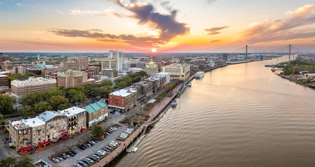 Fototapete Cappuccino Waterfront River Street in Savannah, Georgia. Historic American architecture of old historical city. USA Southern cityscape at sunset  © bilanol