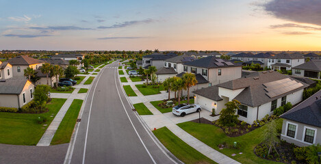 Wealthy residential area in USA suburbs. Rich neighborhood with expensive suburban homes in...