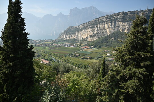 Aerial View From The Mountains At Lake Garda To Riva Del Garda Italy On A Wonderful Sunny Autumn Day With A Few Clouds In The Sky