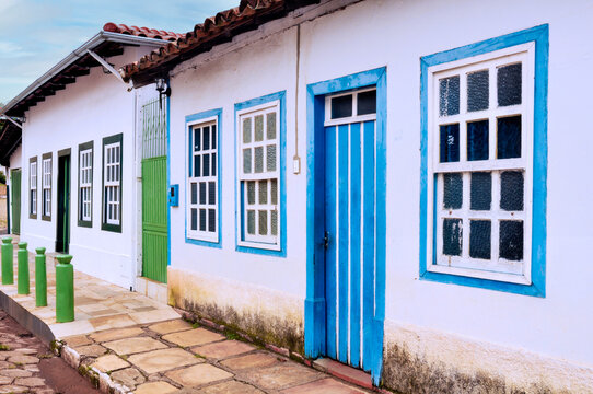 Colonial house door and windows in Corumbá de Goiás. This city was founded in 1730 by the Bandeirantes, explorers came from Sao Paulo State in search of gold. Goias, Brazil,  2019