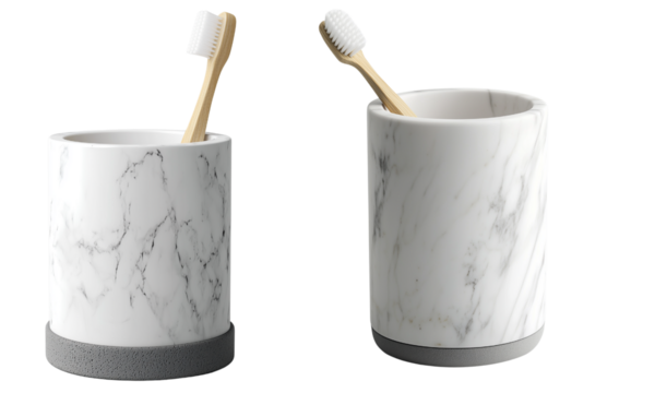 Two marble-patterned toothbrush holders with bamboo toothbrushes, cylindrical design with contrasting bases for a modern bathroom set