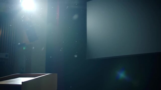 Bright empty stage with lectern and blank screen in conference room ready for presentation