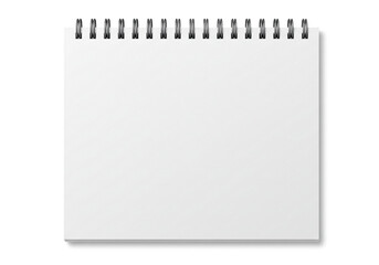 Close up of a blank white spiral notebook with black rings lying on a white surface in studio lighting