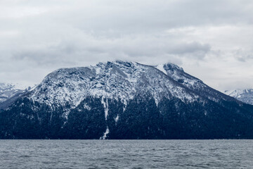 snow covered mountains in winter Nahuel Huapi lake Bariloche Argentina Patagonia