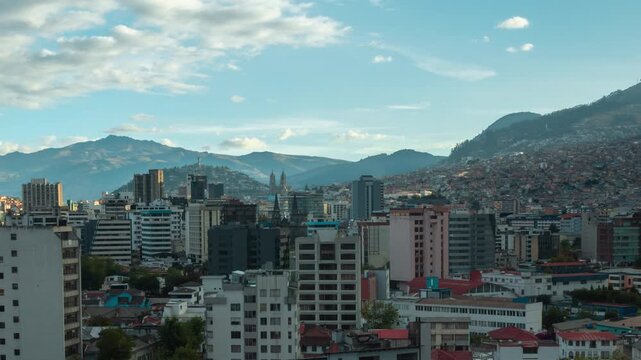 Time-lapse of Panoramic view of the northern part of Quito in the afternoon with the sun setting until the sky darkens - Ecuador