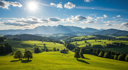 A scenic view of rolling green hills with scattered trees and mountains under a bright sunny sky filled clouds