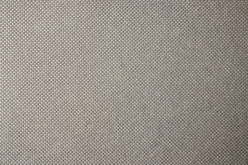 Fototapeta premium Intricate close-up texture of uniform silver-mesh like fabric background