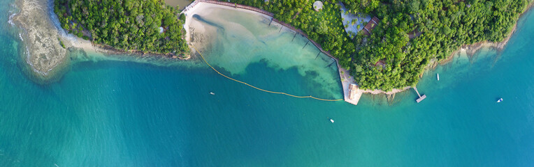 Panorama of a coast as a background from top view. Turquoise water background from top view. Summer seascape from air. Travel image