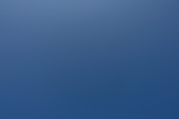 Clear blue sky with bright natural light. Perfect background for nature, freedom, peace, and environmental concepts. Ideal for use in design, travel, and outdoor themes