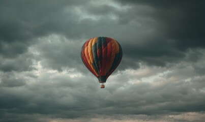Fototapeta premium A colorful hot air balloon against a stormy sky