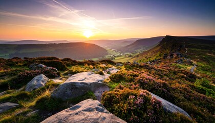 Scenic sunrise over rocky landscape in the Peak District National Park