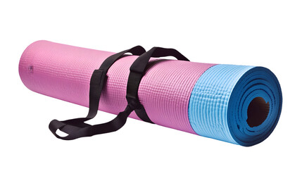 A rolled pink and blue yoga mat secured with black straps against a dark background in a studio setting
