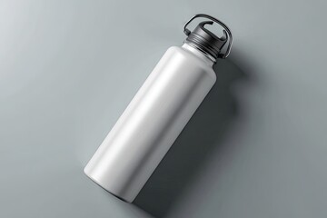 High-angle shot of a white, cylindrical water bottle with a black lid