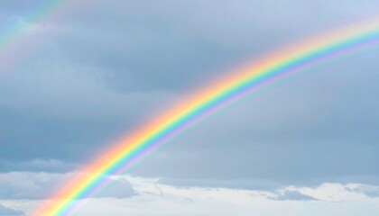 Vibrant Rainbow Arching Across a Cloudy, Dramatic Sky.