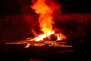 Lava fountains erupt from Halemaʻumaʻu crater during Episode 24 of Kīlauea Volcano's eruption on June 4, 2025, in Hawaiʻi Volcanoes National Park, Big Island, Hawaii.