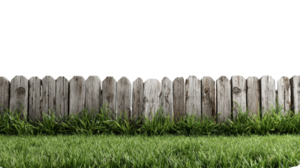 Wooden fence with lush green grass, isolated on a white background.