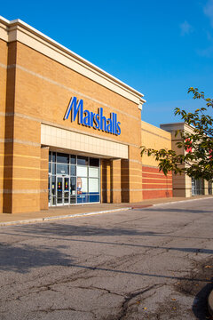 Fairview Heights, IL&mdash;Aug 20, 2025; front entrance to brick strip mall store displaying brand Marshalls a discount retail fashion store.
