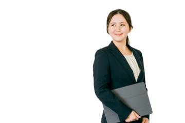 タブレットPC・ノートパソコンを持つアジア人ビジネスウーマン
