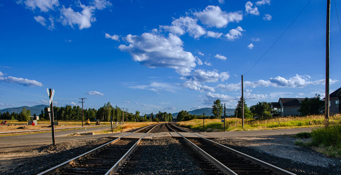 Countryside Railroad Crossing with Blue Sky and Scenic View Idaho ,Sandpoint 