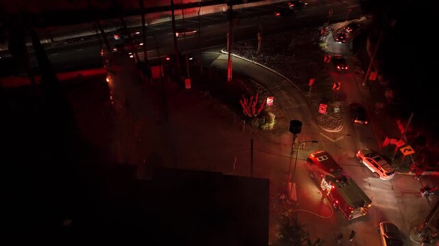 4K Drone Night Video of Firefighters Extinguishing Tree Fire Caused by Fireworks in Los Angeles &ndash; LA Wildfire Emergency, July 4th Independence Day Fire Accident, California Firefighters in Action