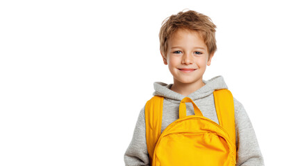 Smiling boy with a yellow backpack on a white isolated background.