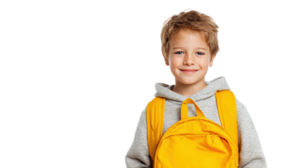 Smiling boy with a yellow backpack on a white isolated background.