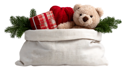 A white santa sack filled with a teddy bear gift box yarn and evergreen branches  isolated on white  or transparent background.