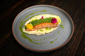 Salmon Fillet with Protein Caviar, Puree and Edible Flowers