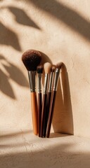 Makeup brushes in warm sunlight