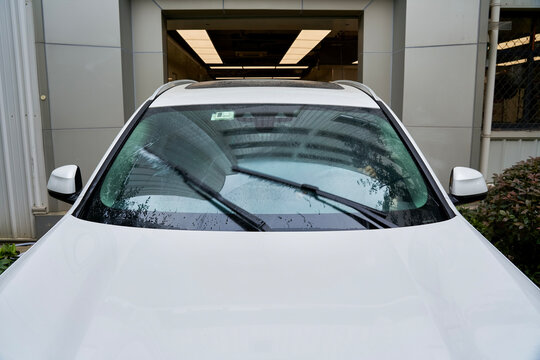 Clean the car window windshields with the car wipers