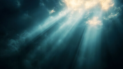 Cinematic background of powerful light beams from the sun breaking through a dramatic, dark and moody sky